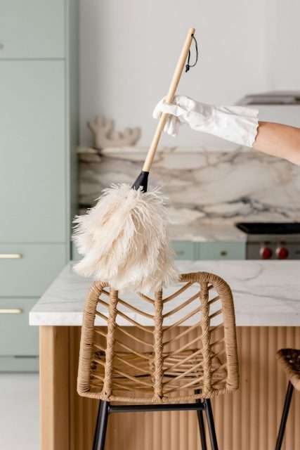 A broom dusting through furnitures